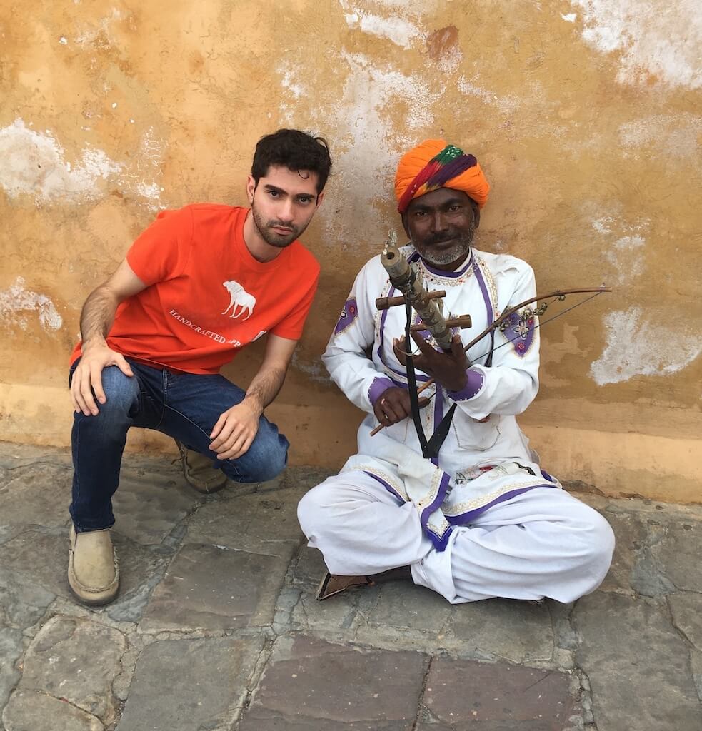 Emmanuel in India with street musician